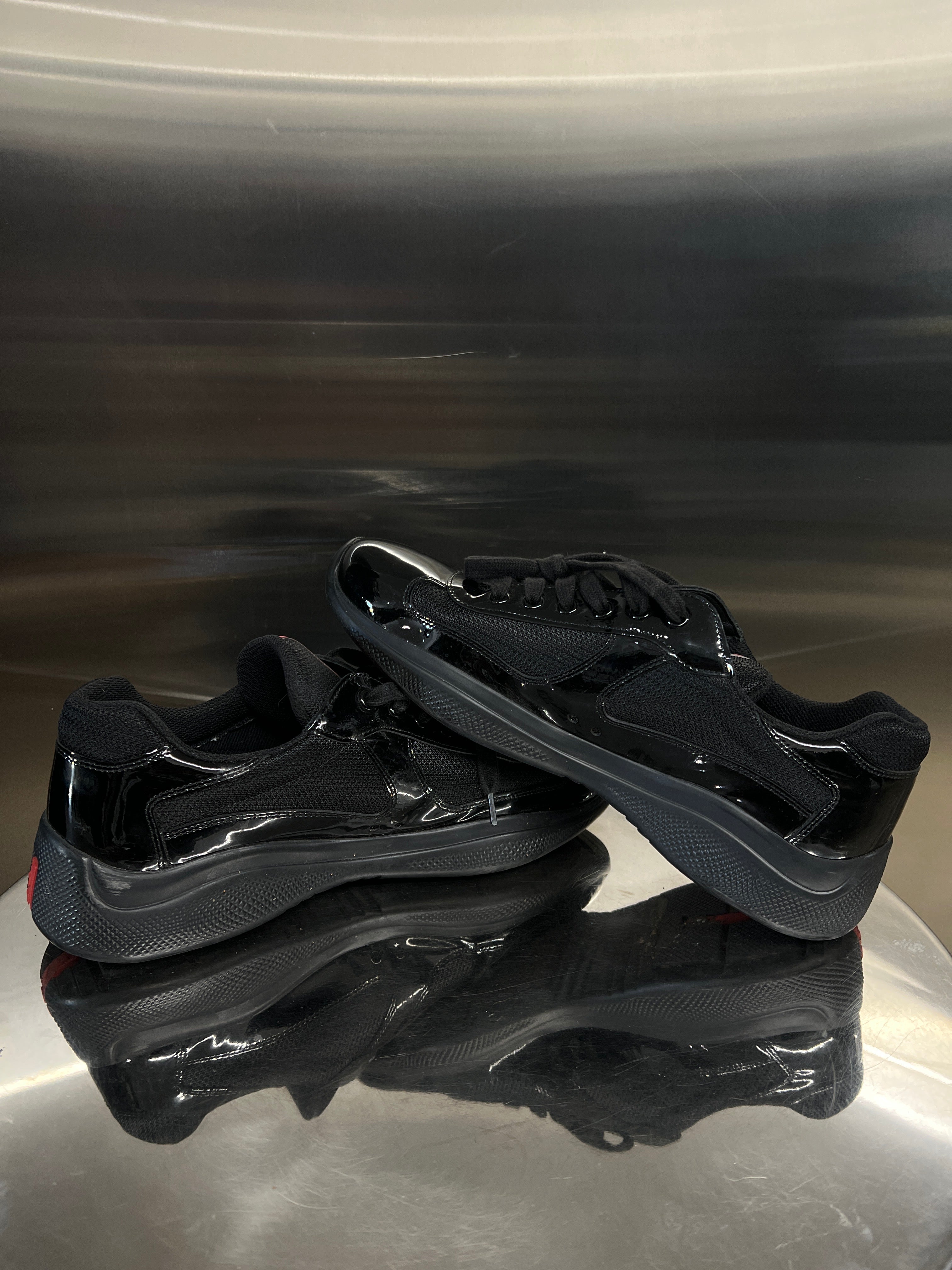 Black Prada cup patent leather