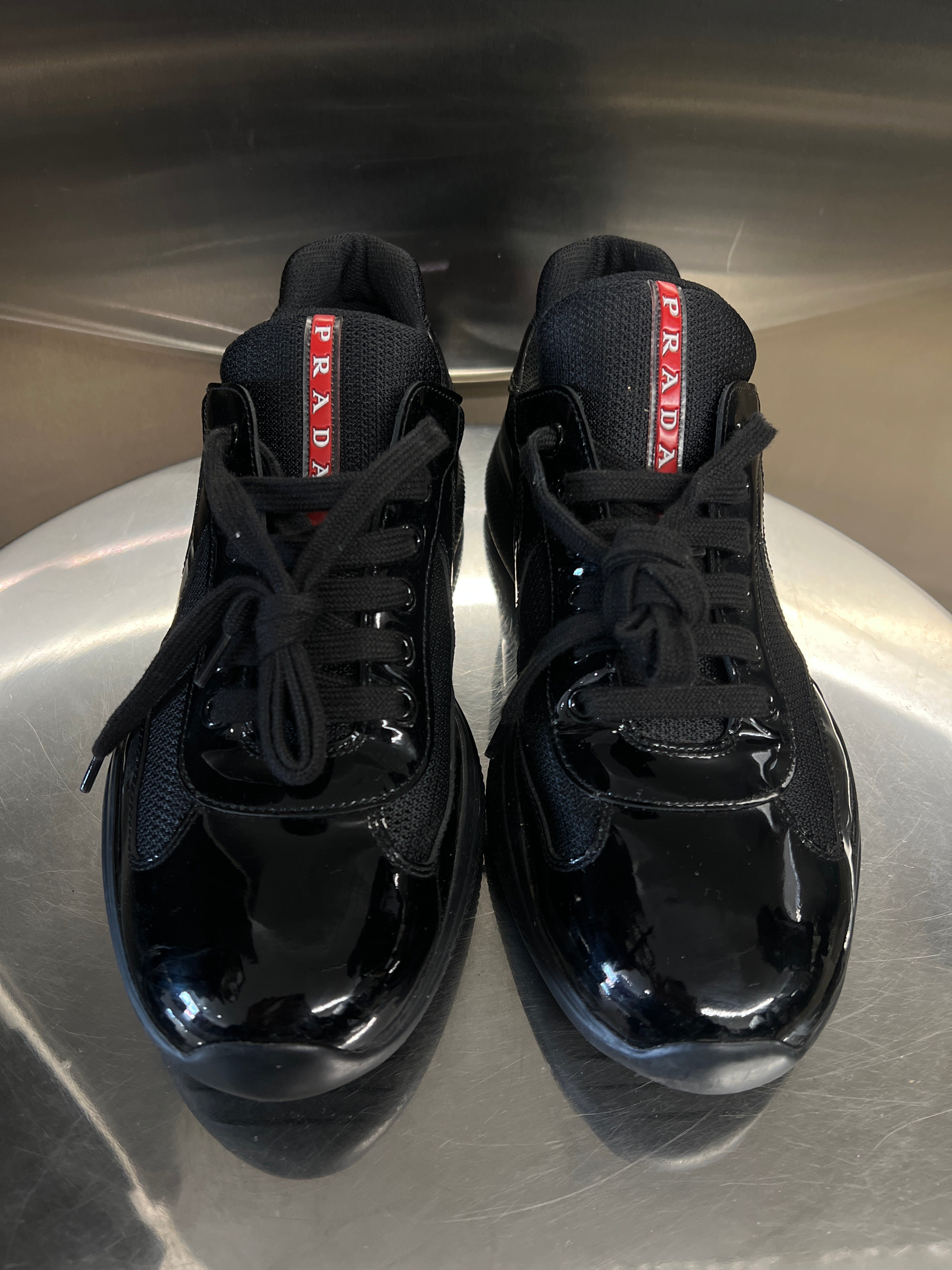 Black Prada cup patent leather