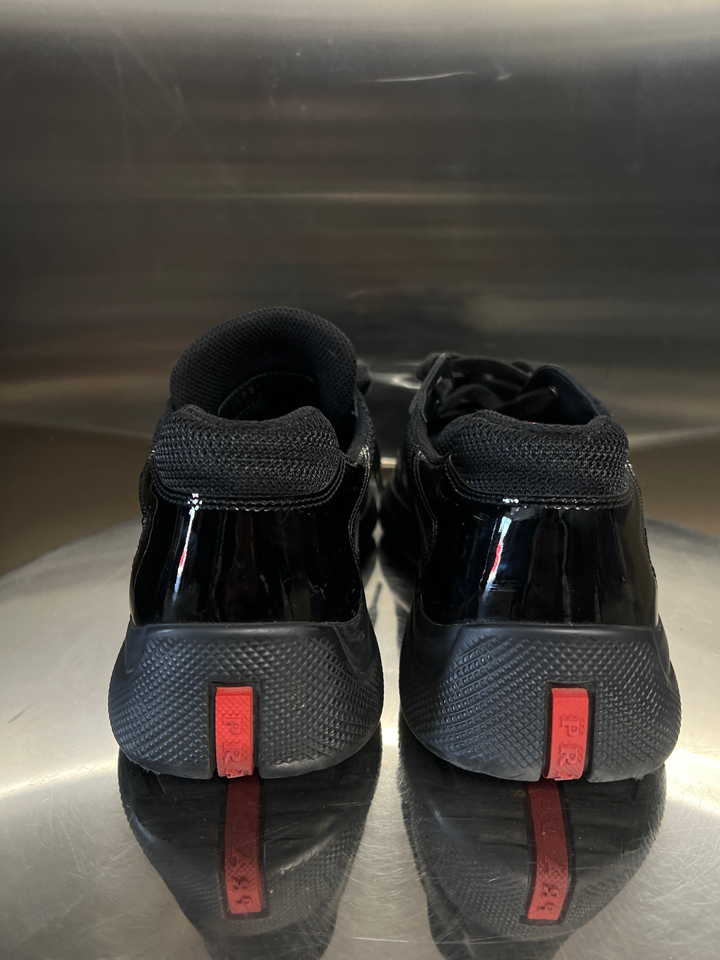 Black Prada cup patent leather