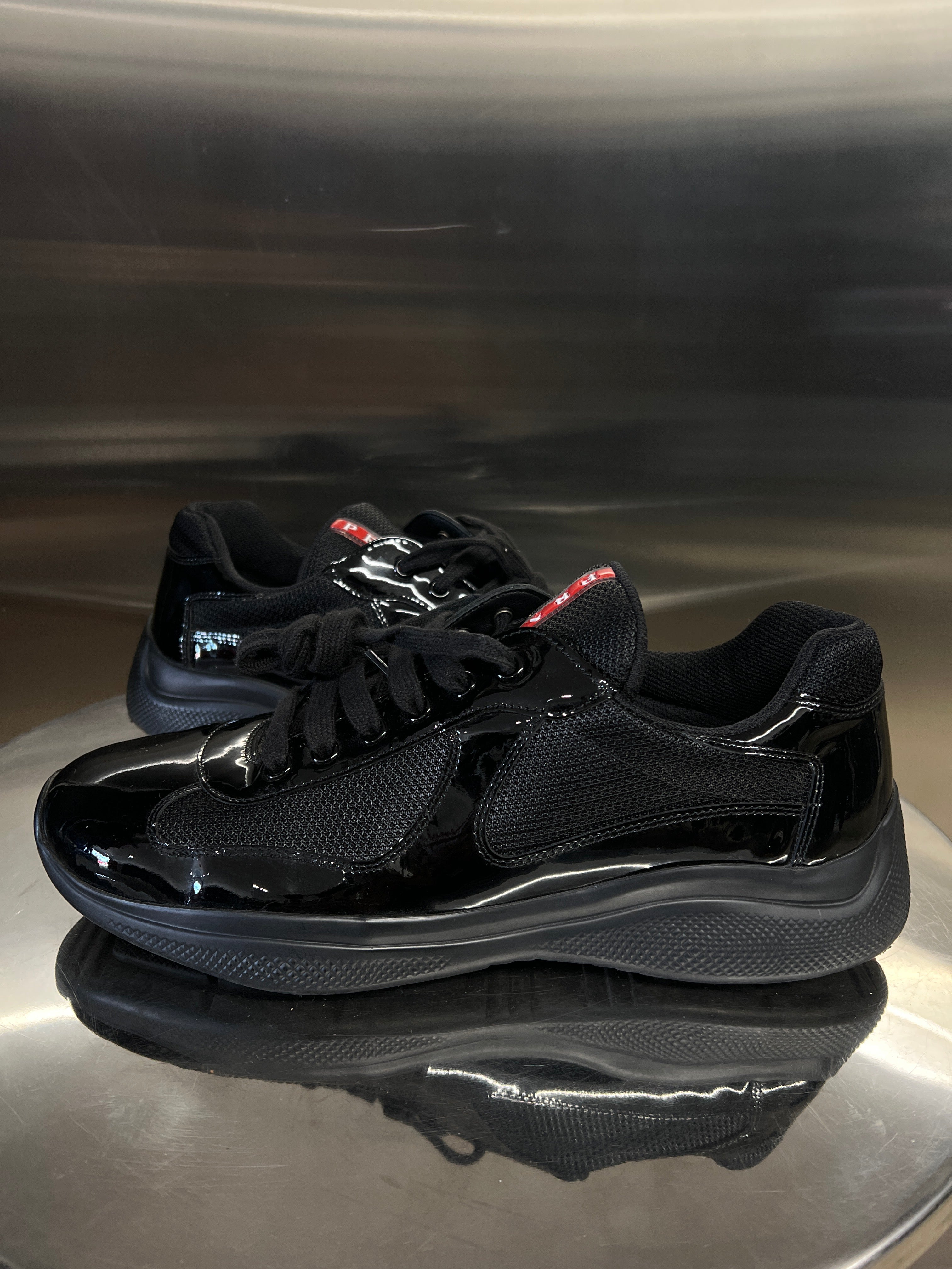 Black Prada cup patent leather