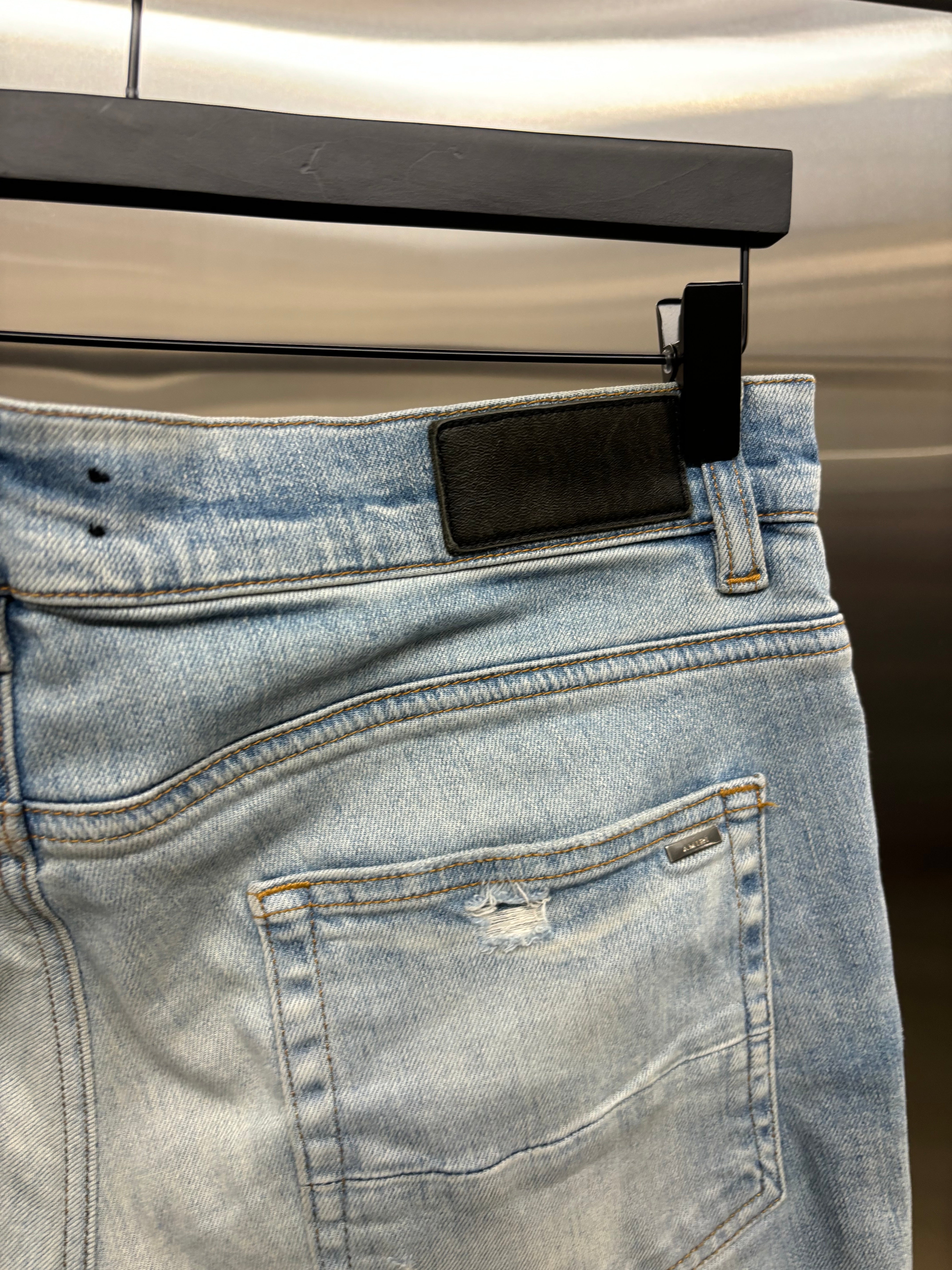 Amiri Mx1 Leather patch jeans