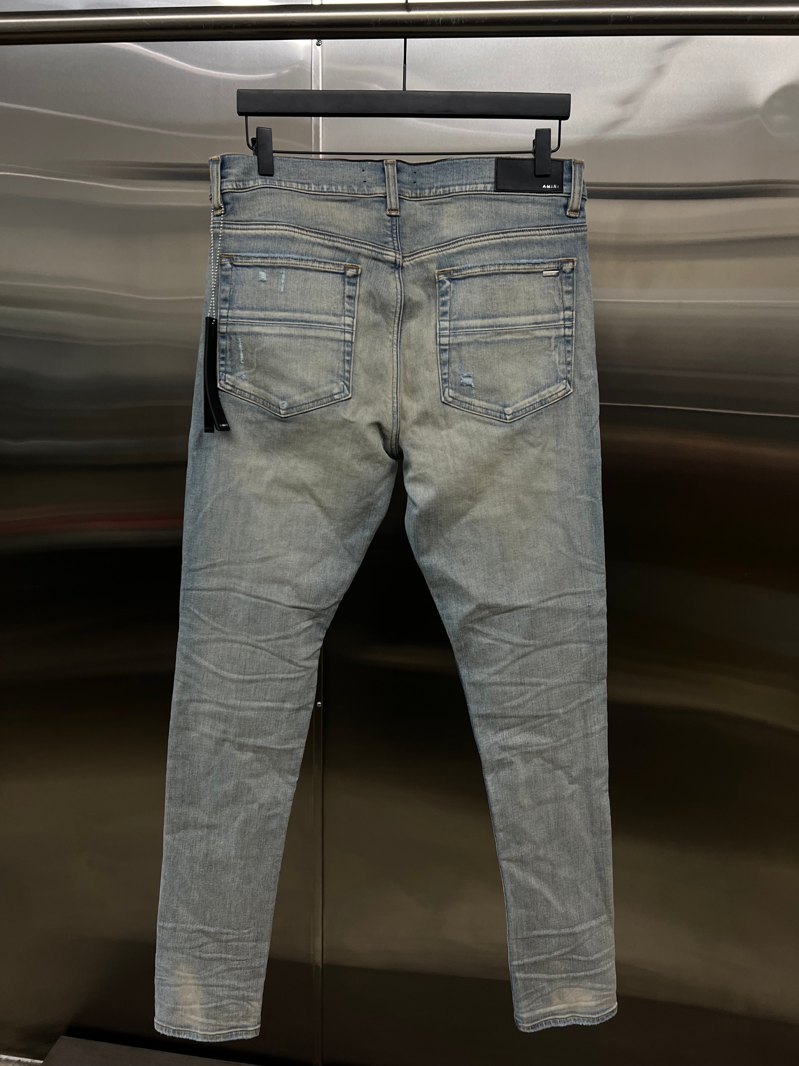 Amiri Mx 1 Black patch jeans